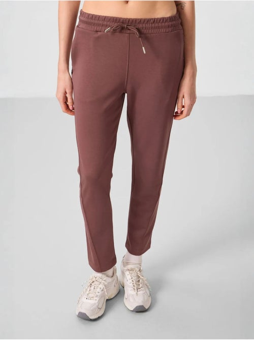 Calças jogger de mulher com fecho de correr tommy - Kiabi Calças jogger de mulher com fecho de correr tommy - Kiabi