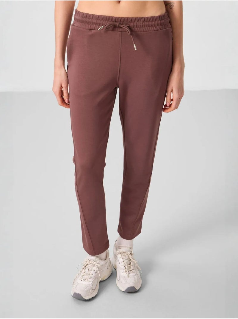 Calças jogger de mulher com fecho de correr tommy Castanho - Kiabi