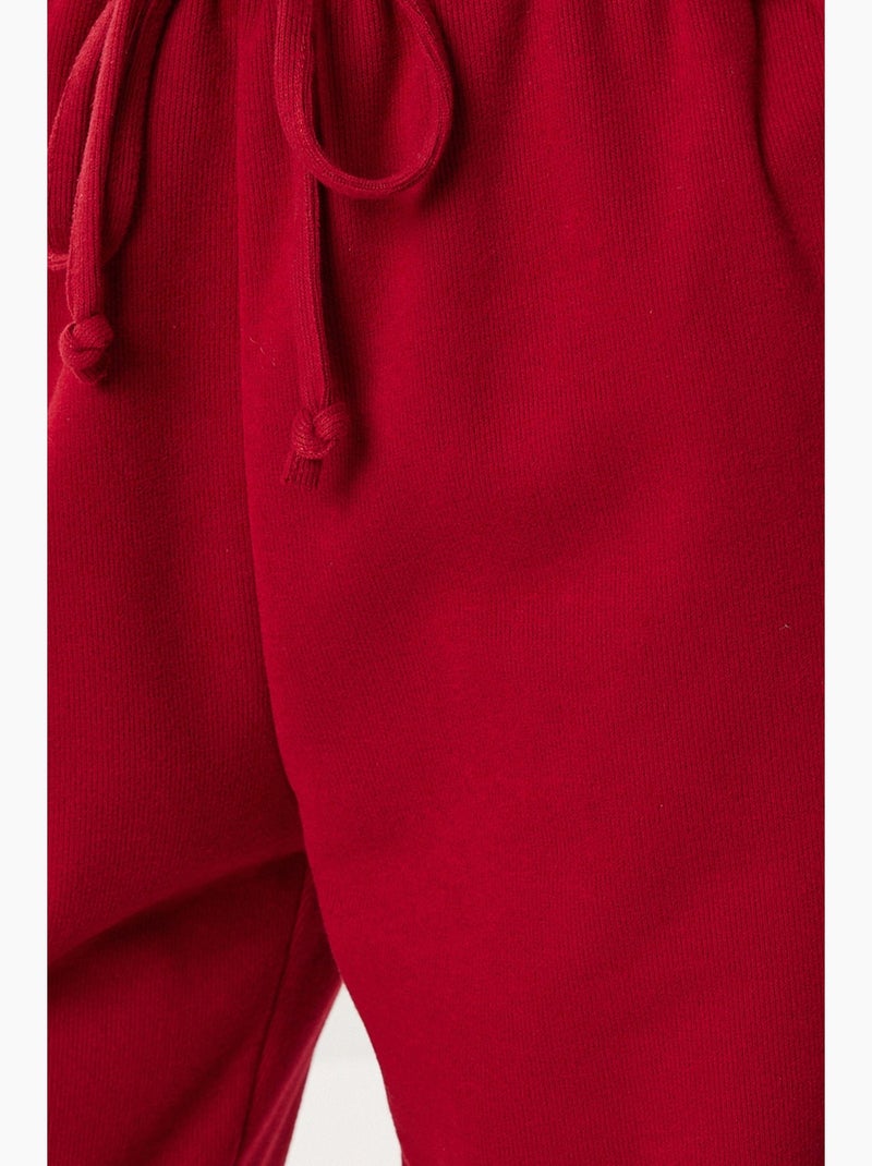 Calças jogger de perna larga com fecho de cordão istanbul Vermelho granada - Kiabi