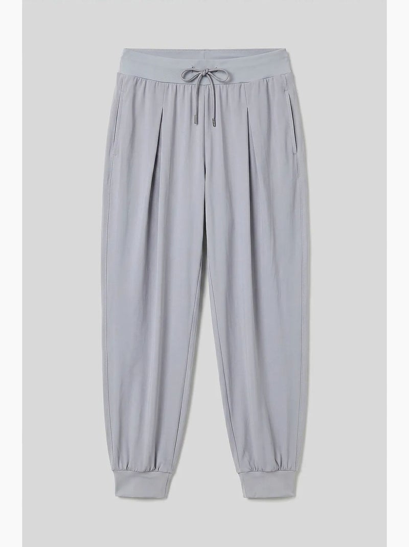 Calças jogger em jersey fino de cintura média com bolso tommy Areia - Kiabi