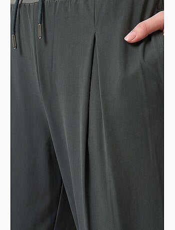 Calças jogger em jersey fino de cintura média com bolso tommy