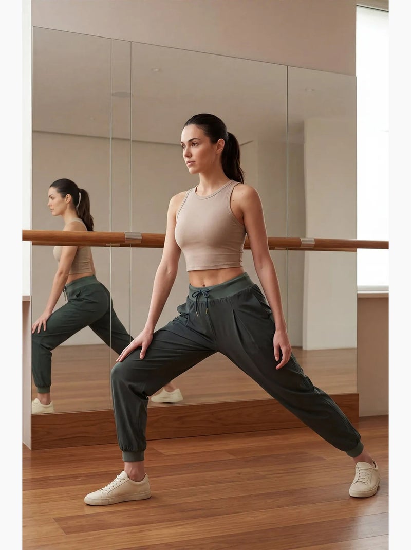 Calças jogger em jersey fino de cintura média com bolso tommy Cáqui - Kiabi