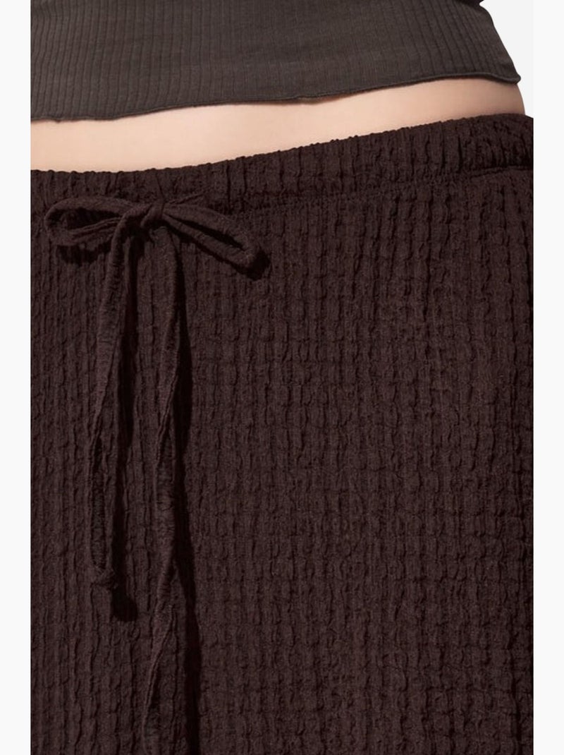 Calças jogger femininas em tecido busem Castanho-chocolate - Kiabi