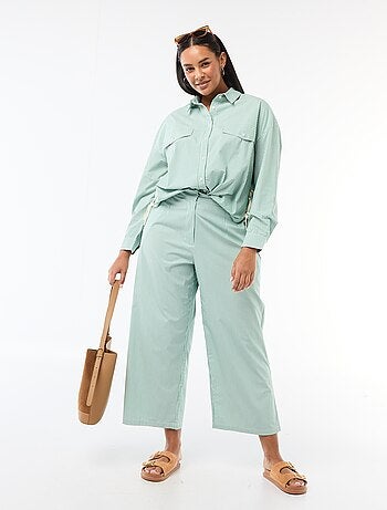 Calças largas às riscas em popelina