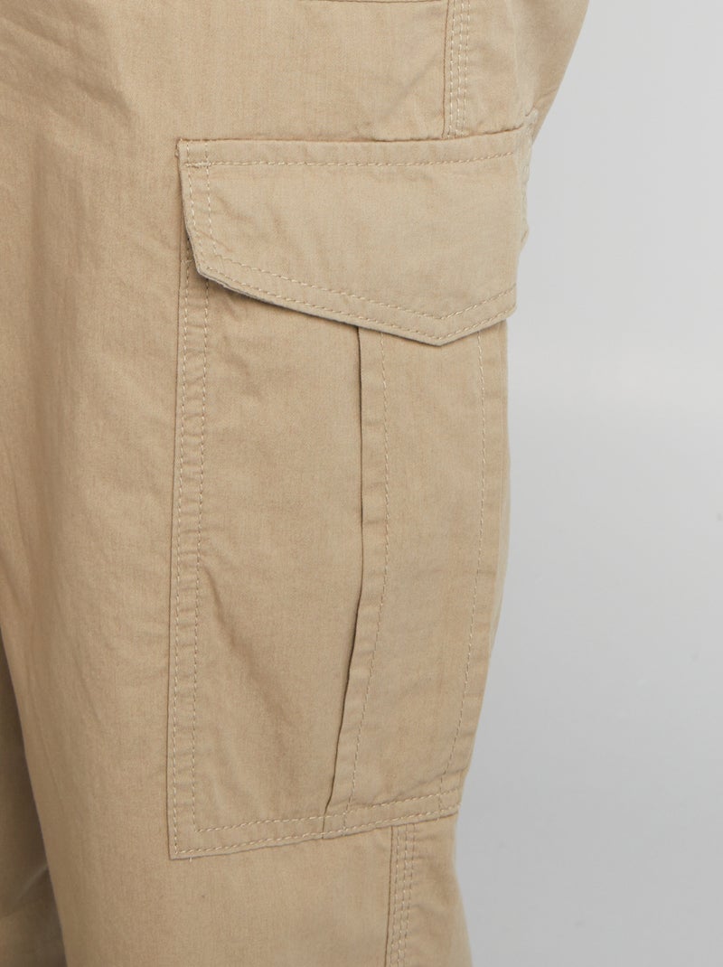 Calças largas com bolsos com abas BEGE - Kiabi