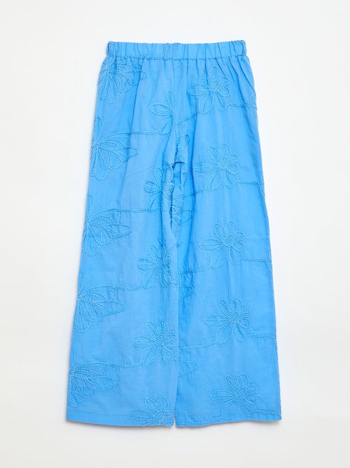 Calças largas com bordados - Kiabi