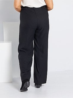 Calças largas com cinto - Kiabi