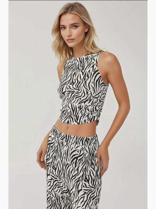 Calças largas com estampado de zebra hiccup - Kiabi Calças largas com estampado de zebra hiccup - Kiabi