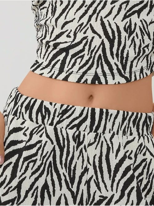 Calças largas com estampado de zebra - Kiabi Calças largas com estampado de zebra - Kiabi