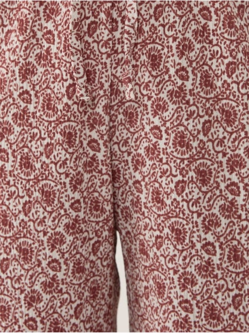 Calças largas com estampado descontraído - Kiabi Calças largas com estampado descontraído - Kiabi