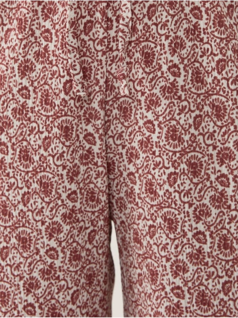 Calças largas com estampado descontraído Rosa velho - Kiabi