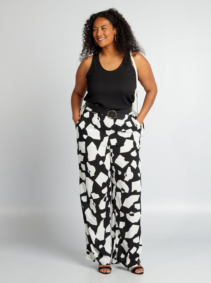 Calças largas com estampado gráfico PRETO - Kiabi
