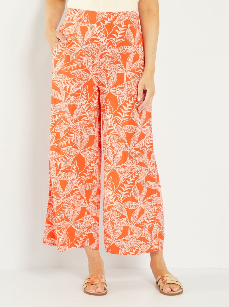 Calças largas com estampado LARANJA - Kiabi