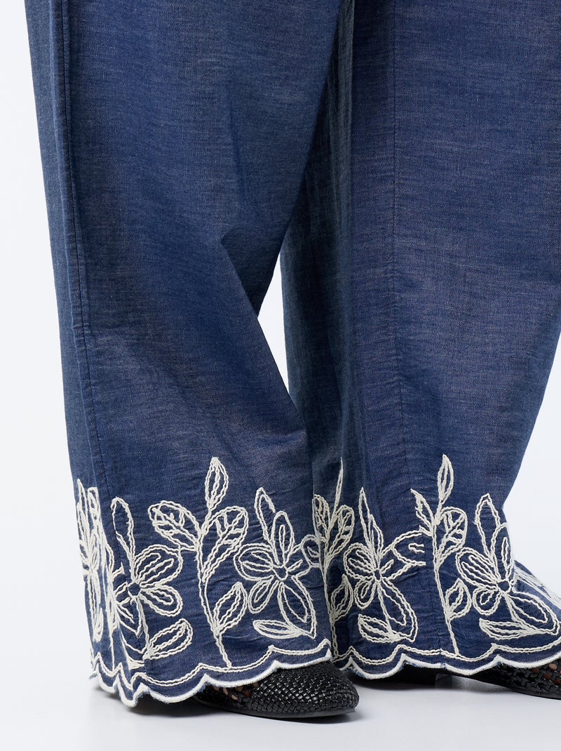 Calças largas com estampados bordados Azul - Kiabi