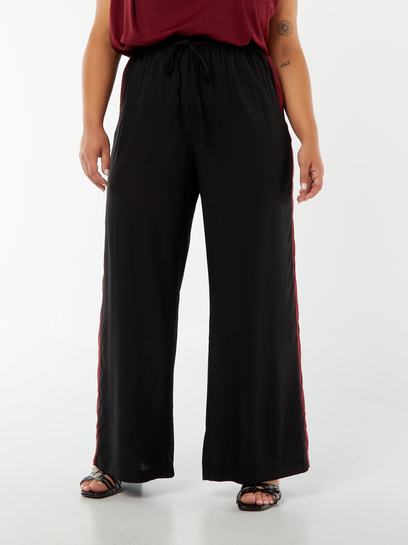 Calças largas com faixas contrastantes Preto - Kiabi