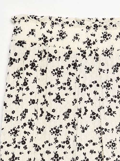Calças largas com folhos na bainha - Kiabi Calças largas com folhos na bainha - Kiabi
