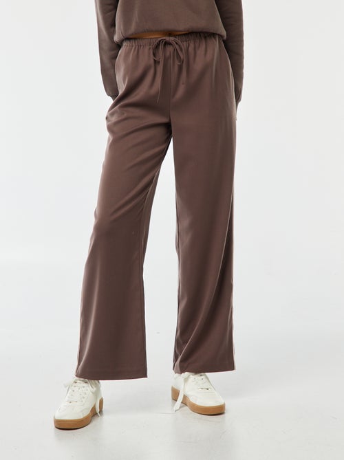 Calças largas com orla de lado - Kiabi