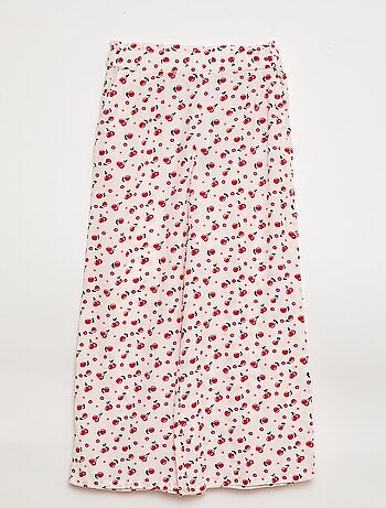 Calças largas com padrão e cintura elástica