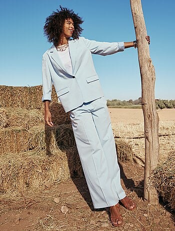 Calças largas de cintura subida com 5 bolsos