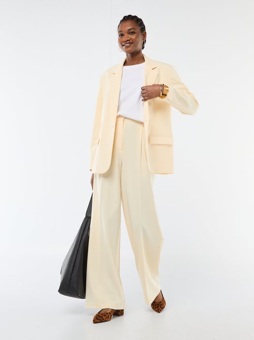 Calças largas de cintura subida com 5 bolsos - Kiabi