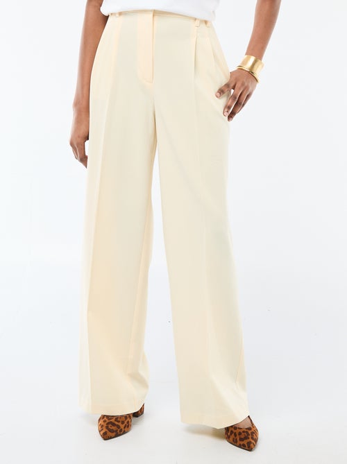 Calças largas de cintura subida com 5 bolsos - Kiabi