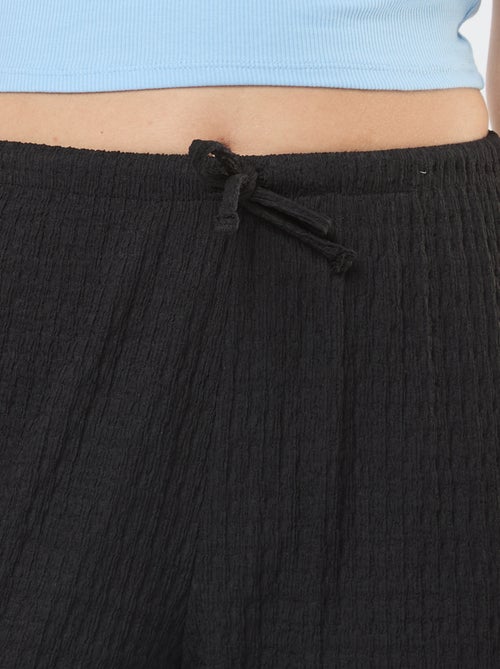 Calças largas de malha crepe - Kiabi