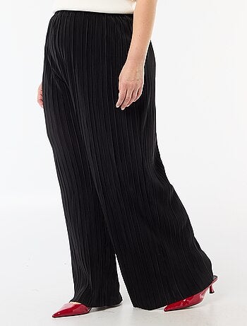 Calças largas elásticas caneladas