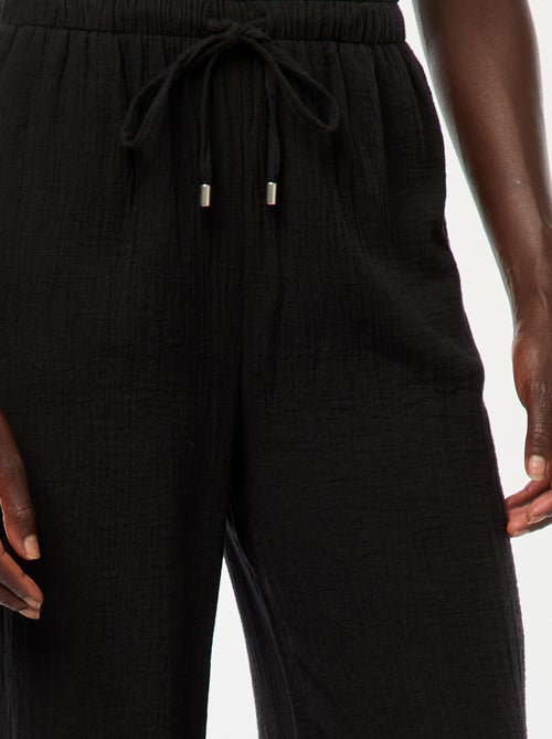 Calças largas em gaze de algodão - Kiabi