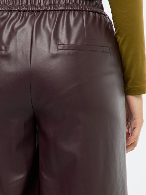 Calças largas em imitação de couro lisa - Kiabi