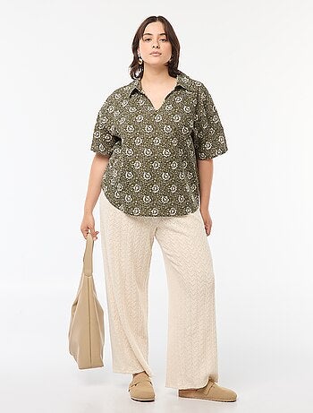 Calças largas em malha ajurada