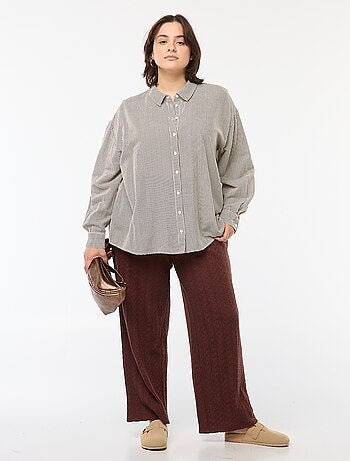 Calças largas em malha ajurada