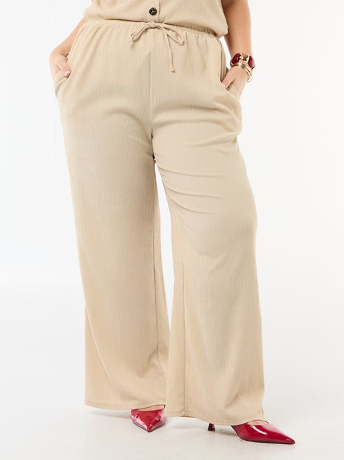 Calças largas em malha crepe - Kiabi