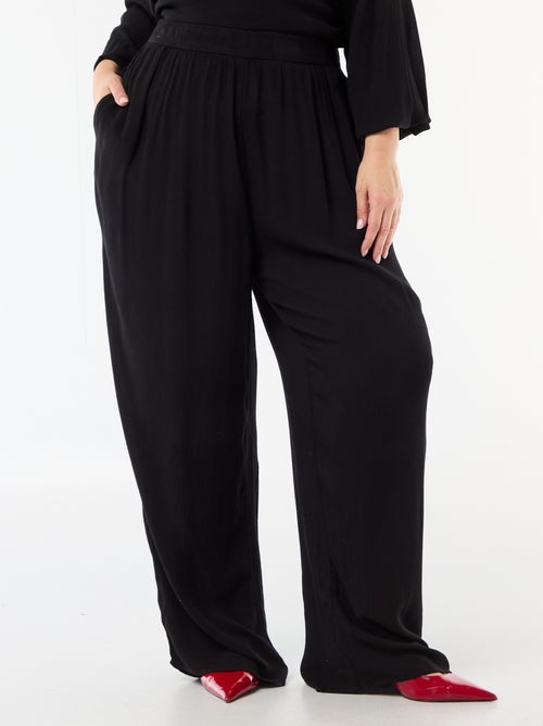 Calças largas em malha crepe - Kiabi