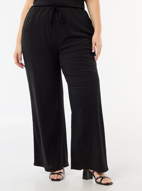 Calças largas em malha crepe - Kiabi