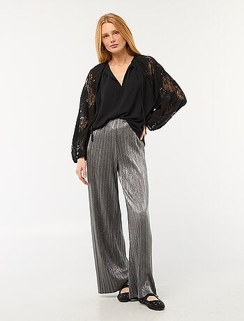 Calças largas em malha plissada