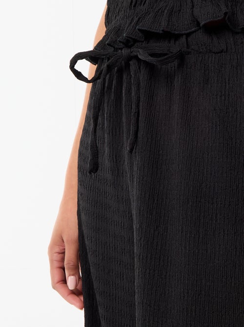 Calças largas em malha smock - Kiabi