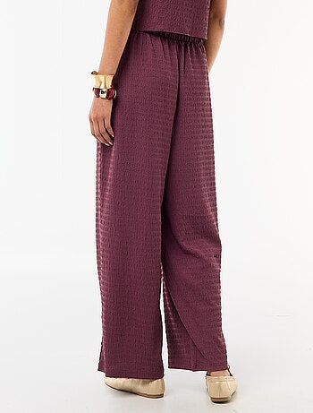 Calças largas em malha smock