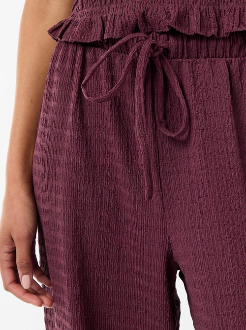 Calças largas em malha smock - Kiabi