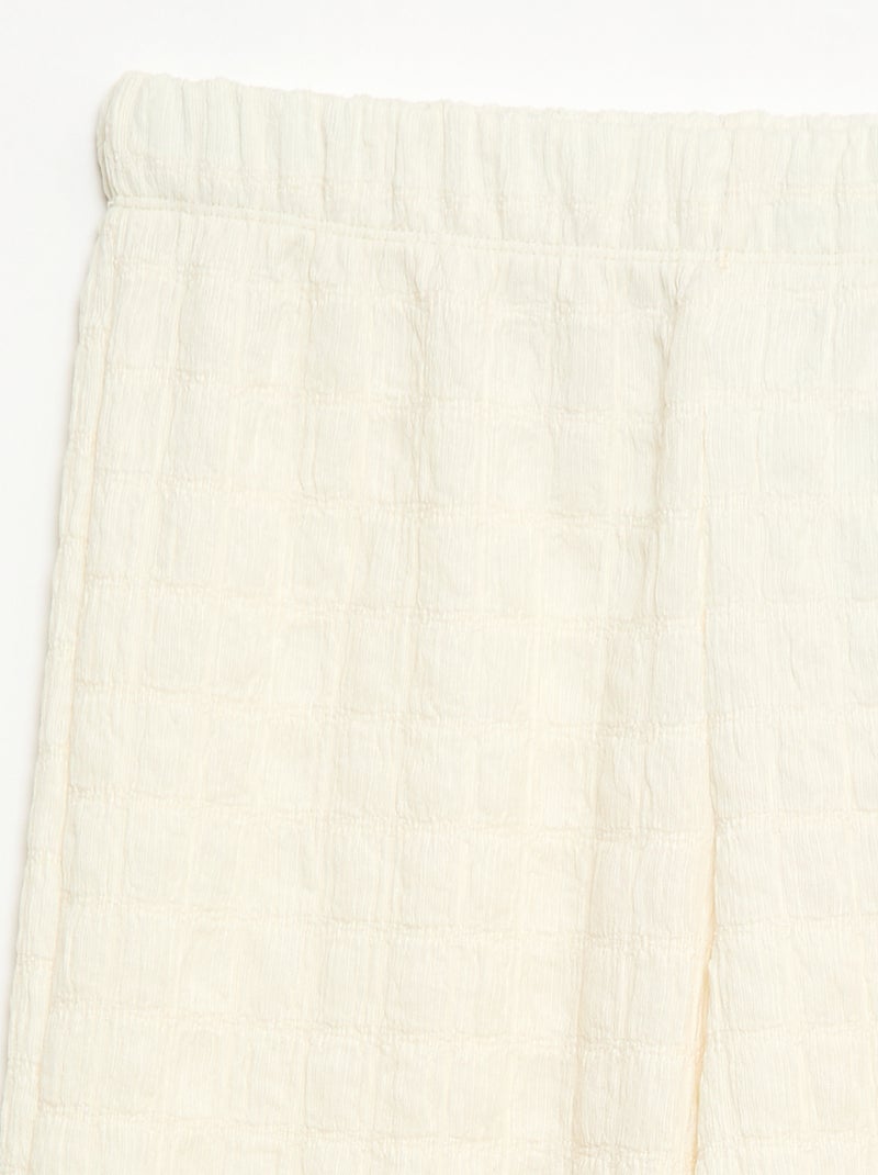 Calças largas em malha stretch Bege - Kiabi