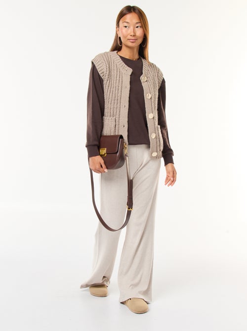 Calças largas em material canelado - Kiabi