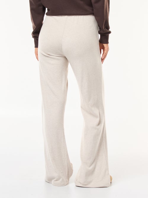 Calças largas em material canelado - Kiabi