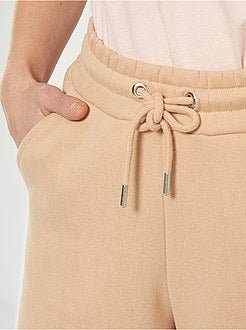 Calças largas em moletão - Kiabi