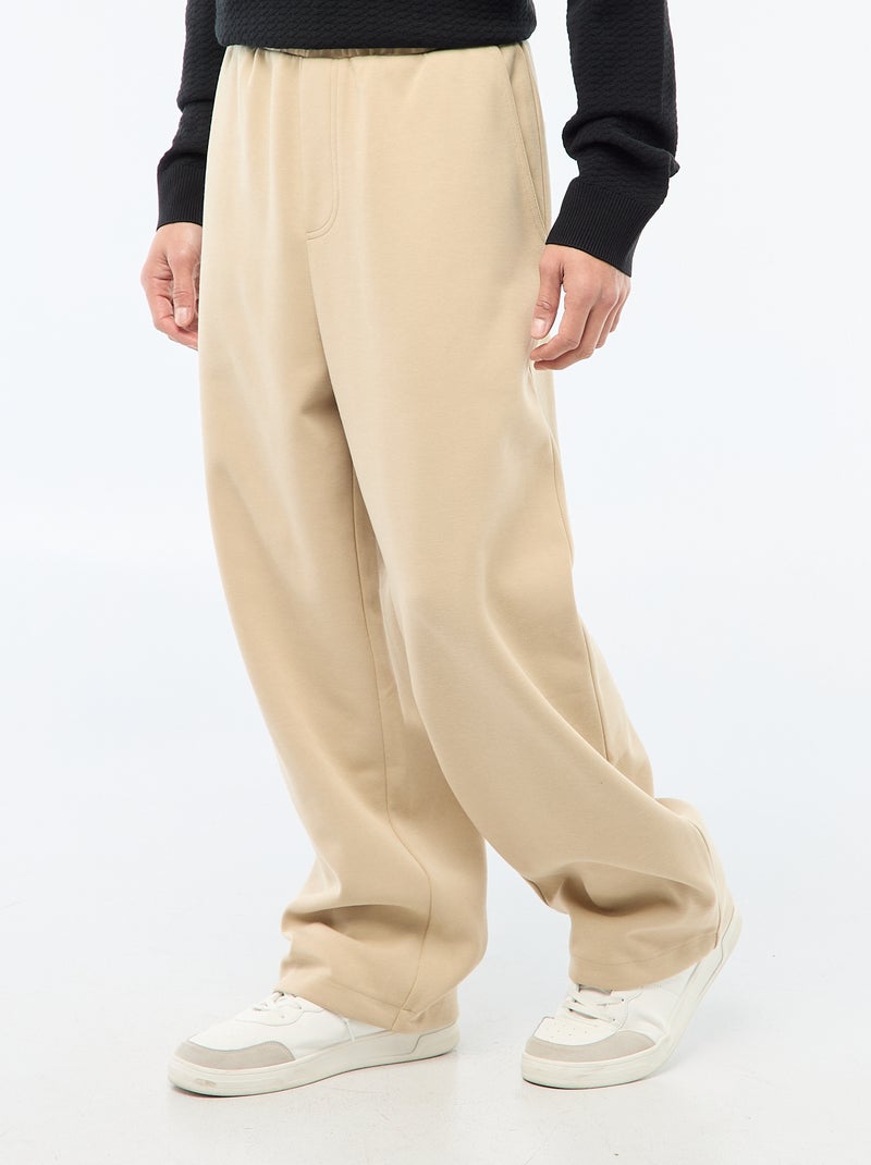 Calças largas estilo jogging Bege - Kiabi