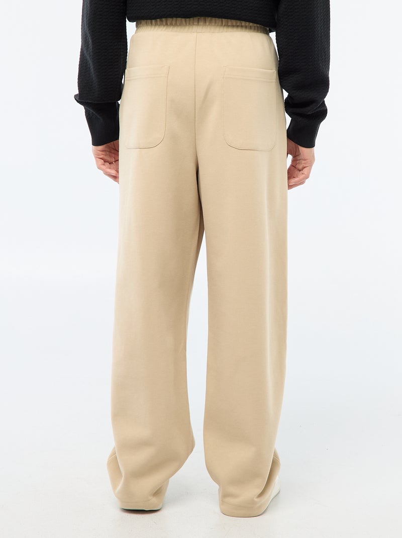 Calças largas estilo jogging Bege - Kiabi