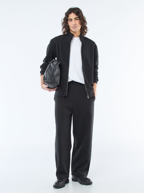 Calças largas estilo jogging - Kiabi Calças largas estilo jogging - Kiabi