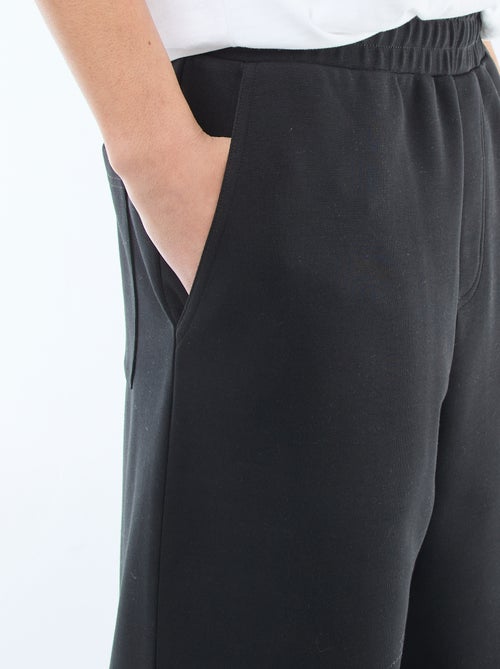 Calças largas estilo jogging - Kiabi Calças largas estilo jogging - Kiabi