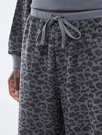 Calças largas felpudas com padrão de leopardo