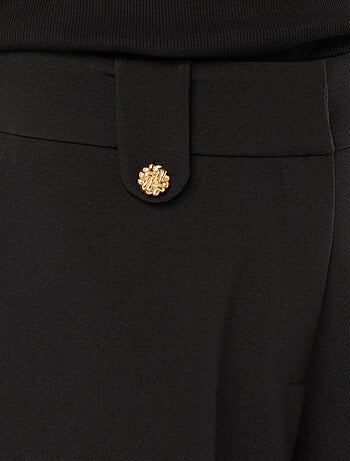 Calças largas lisas com fecho de correr e gancho