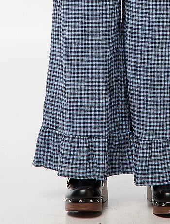 Calças largas vichy com folhos