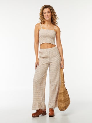 Calças largas vichy com folhos